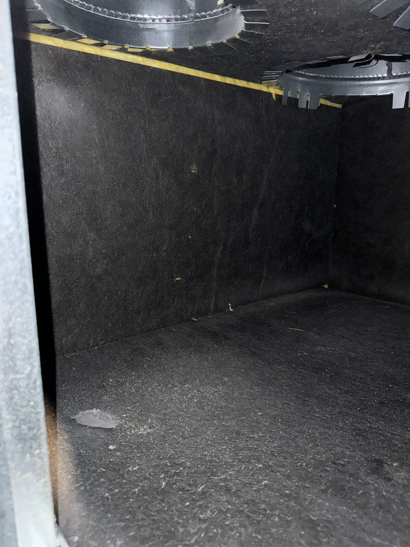 Dusty air duct interior before cleaning